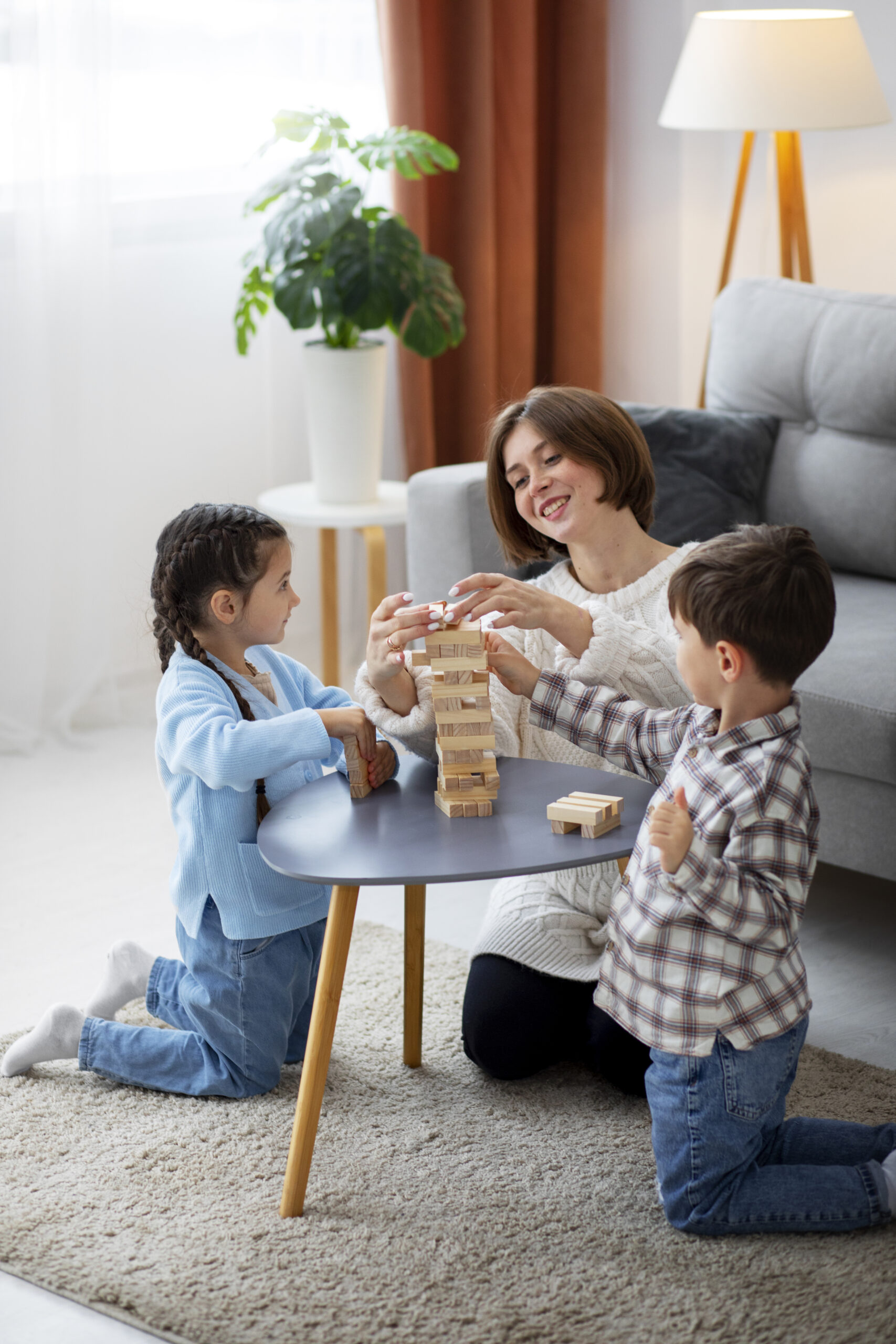 mother-playing-with-kids-full-shot